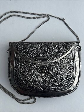 From St Xavier Embossed Metal Floral Crossbody Clutch Silver